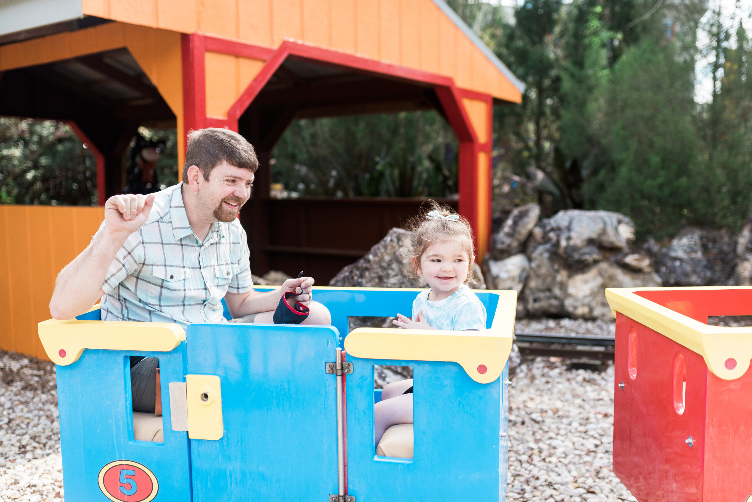 john naylor and daughter on train ride at legoland florida