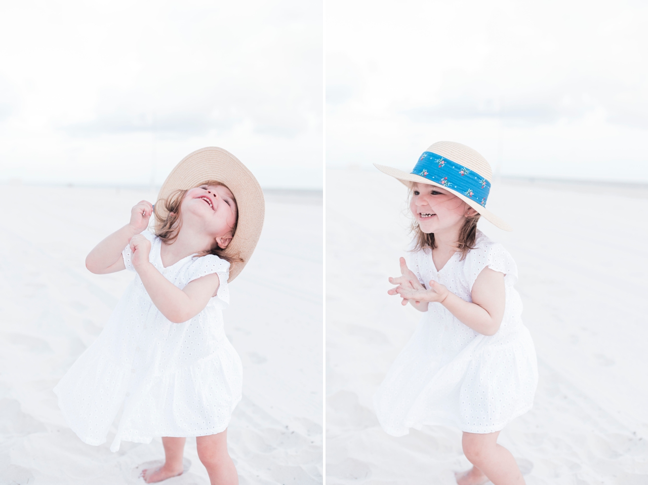 little girl laughing on the beach in gulf shores wearing white dress and hat