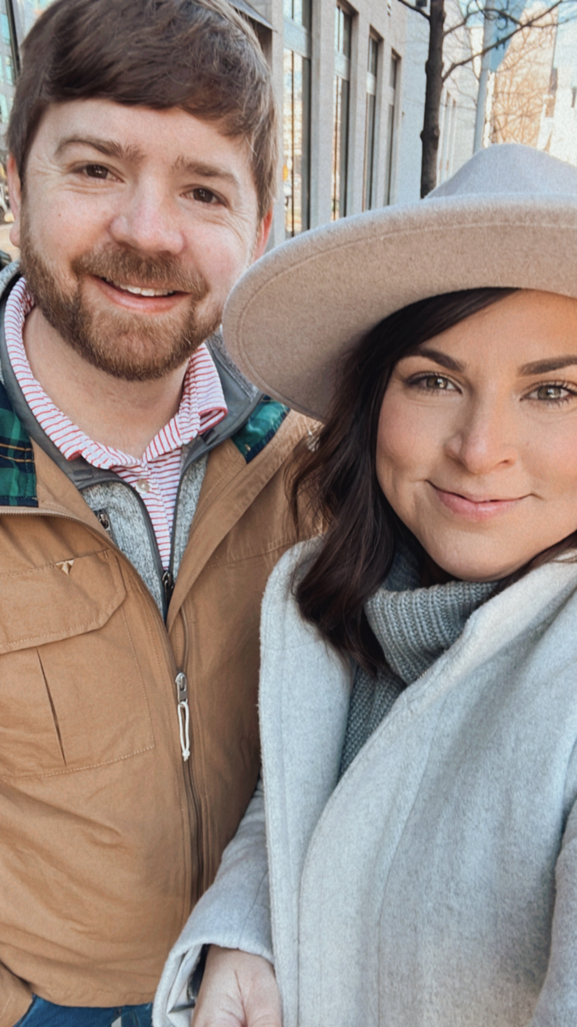 downtown nashville the gulch woman and man wearing coats and hat, nashville travel guide