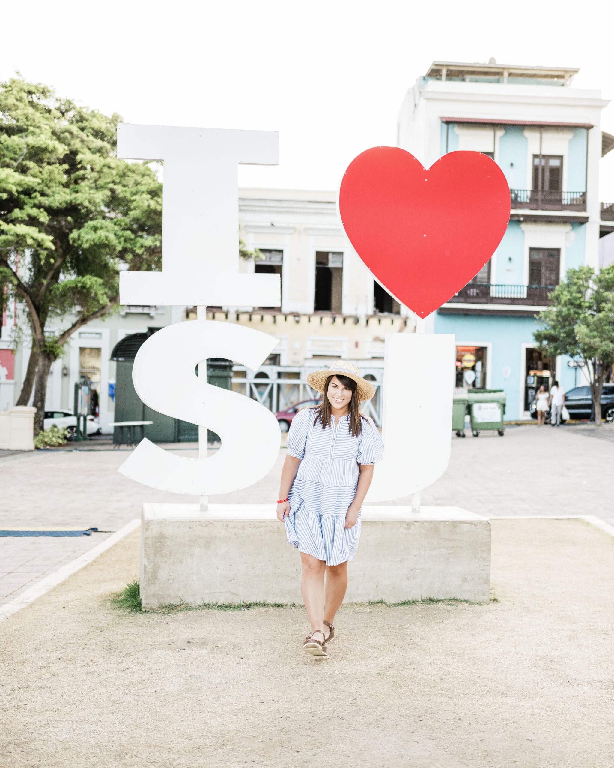 female in front of I love San Juan sign in Old San Juan