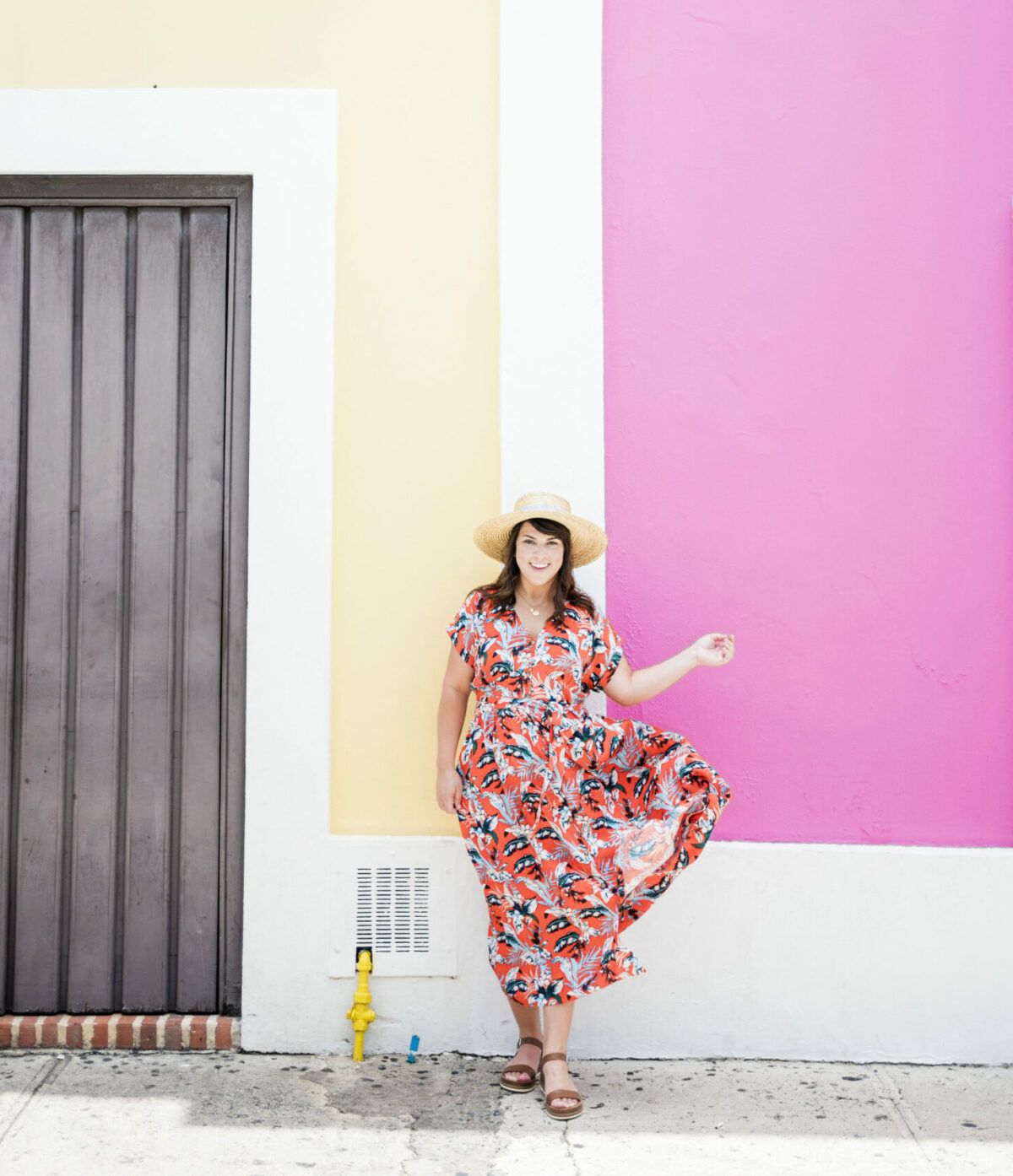 yellow and pink wall, female toss dress skirt in air