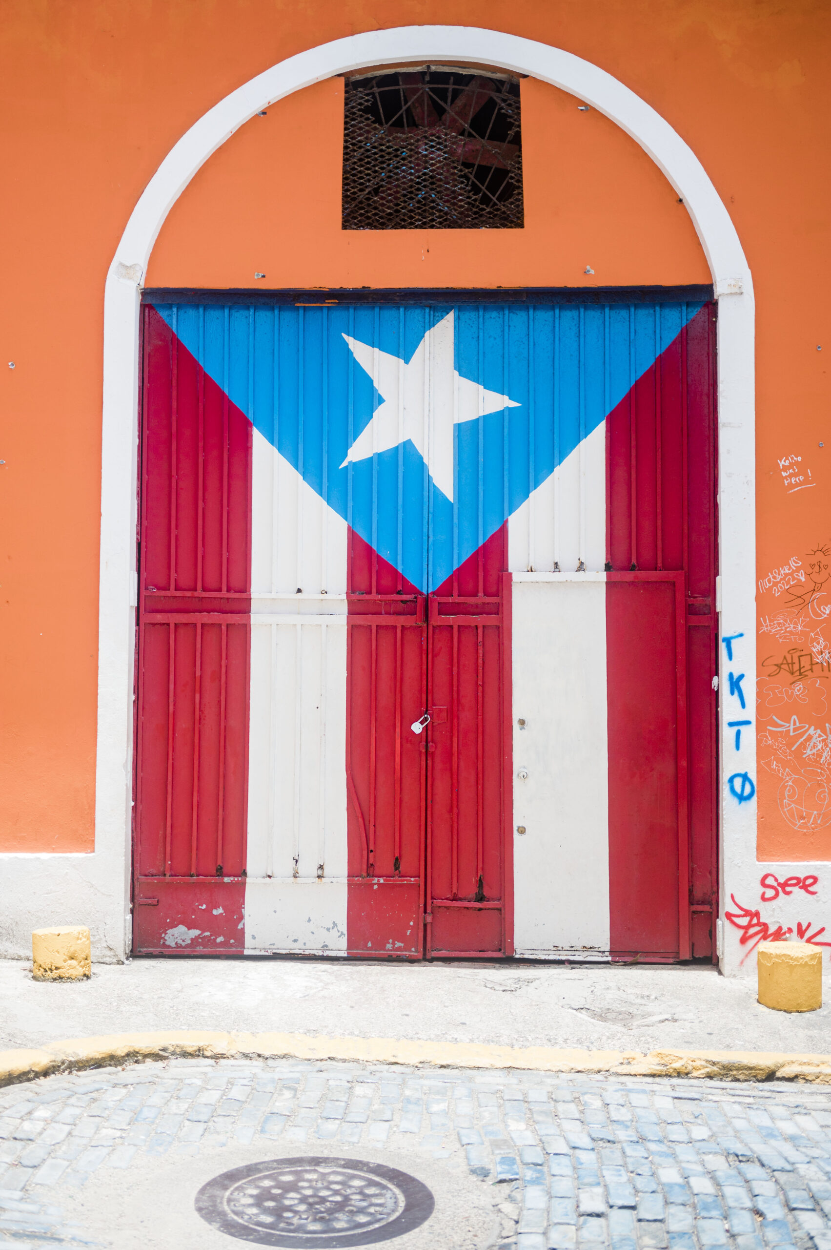 puerto rican flag painted on building in old san juan
