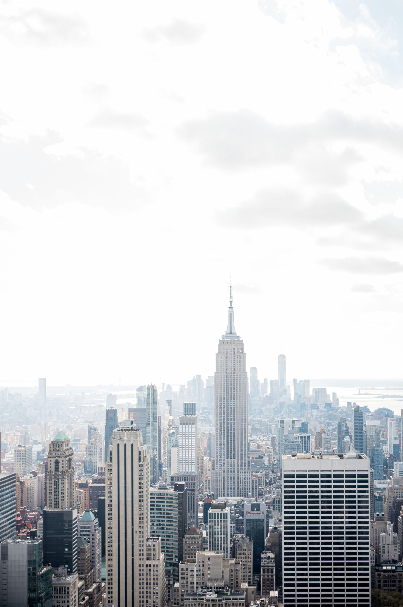 The view from the top of the rockefeller plaza of empire state building and other skyscrapers in New York City.