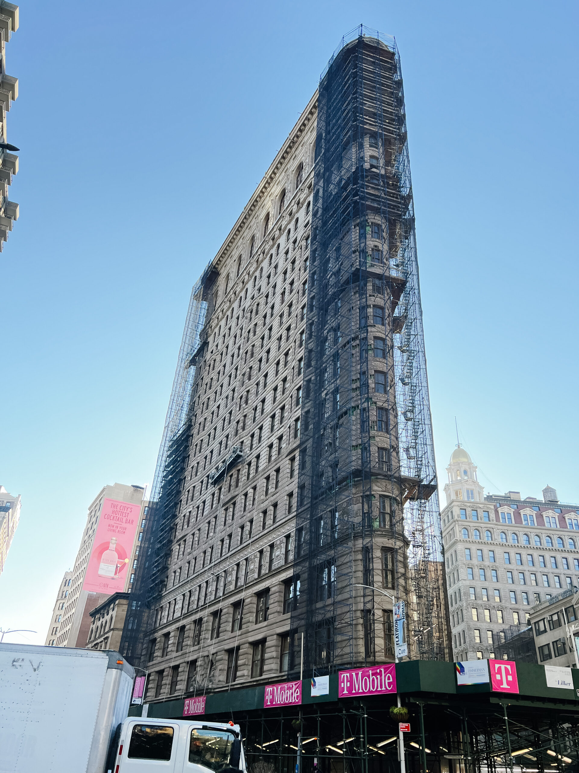 Flat Iron Building in New York City surrounded by scaffolding 