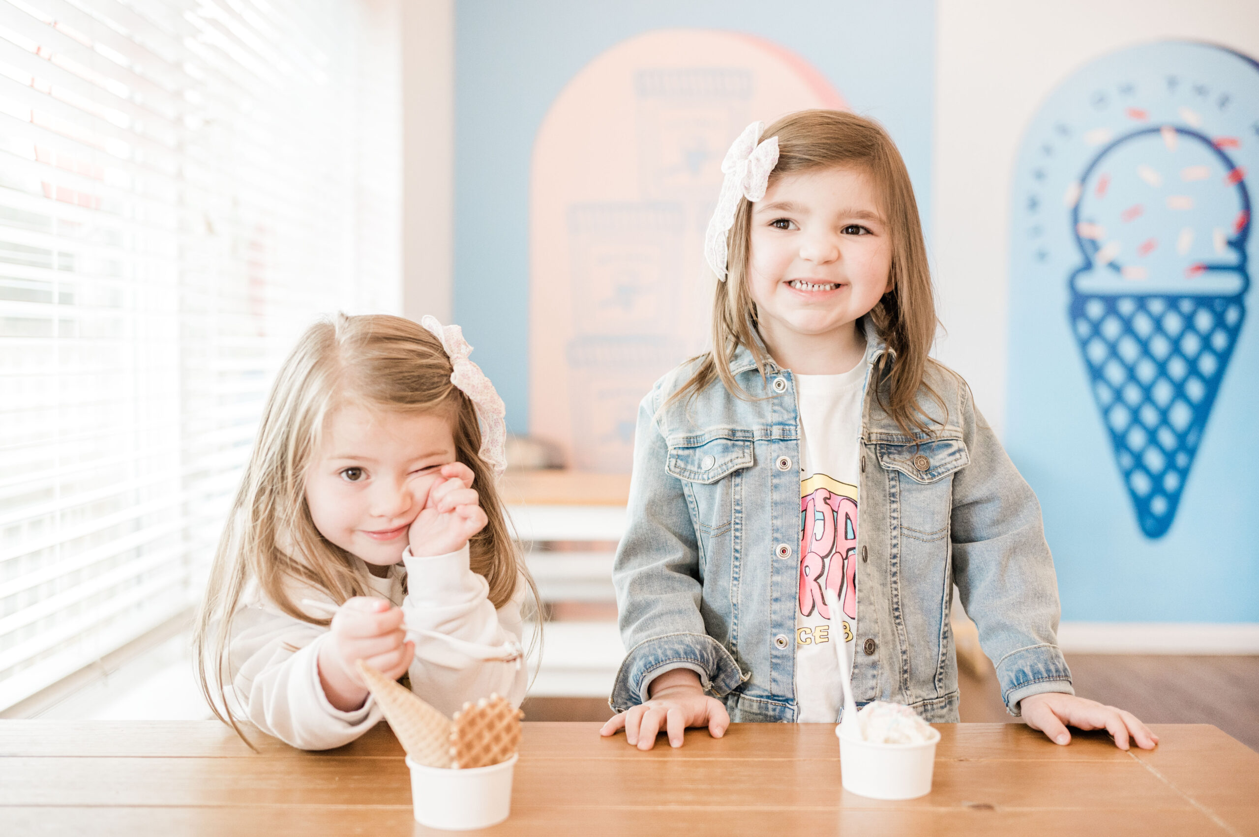 Two girls eating ice cream at Mayday Ice Cream in Saint Augustine