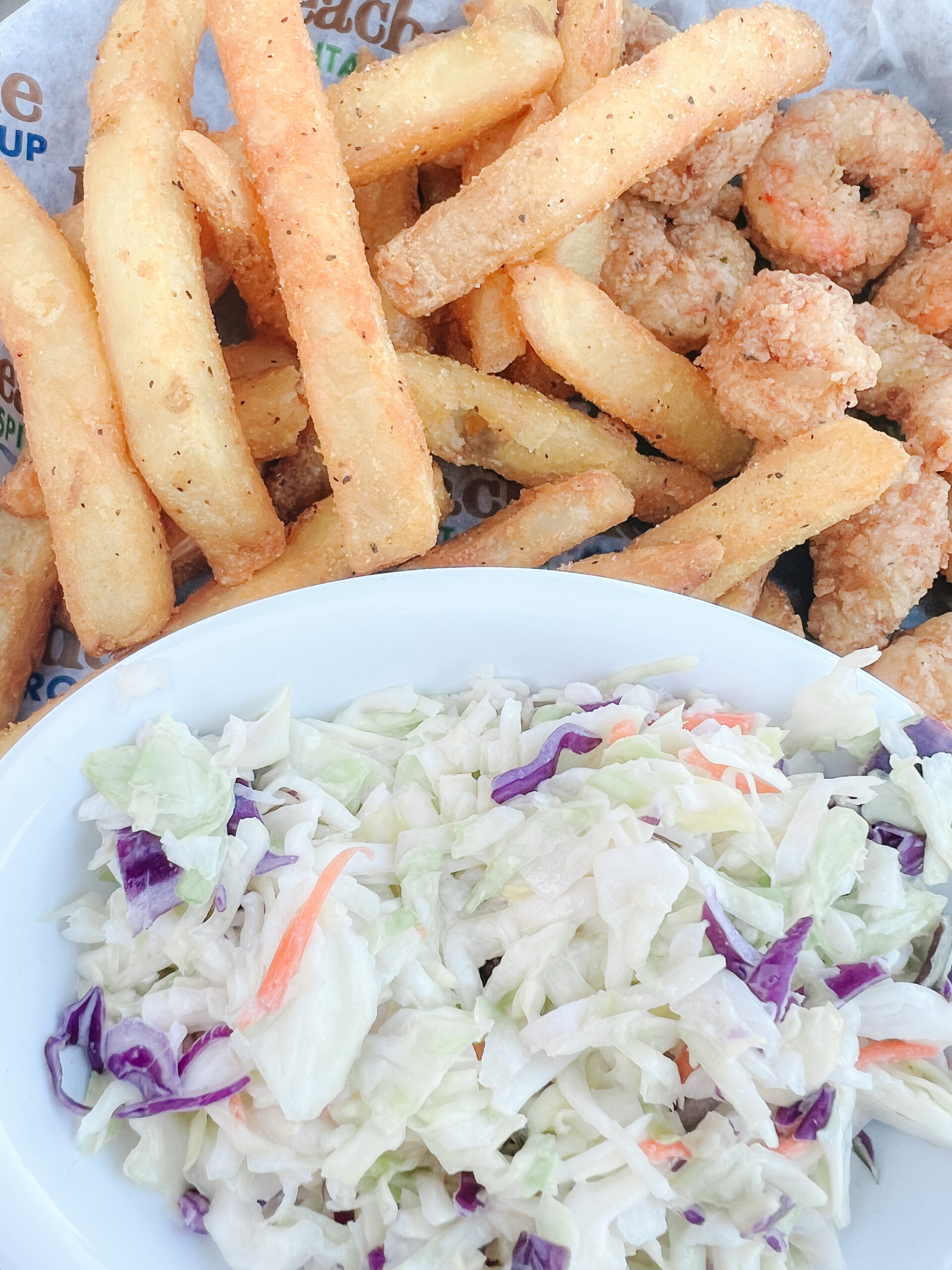 Fried shrimp, french fries, and cole slaw at Crabby's Beachside in Saint Augustine Florida