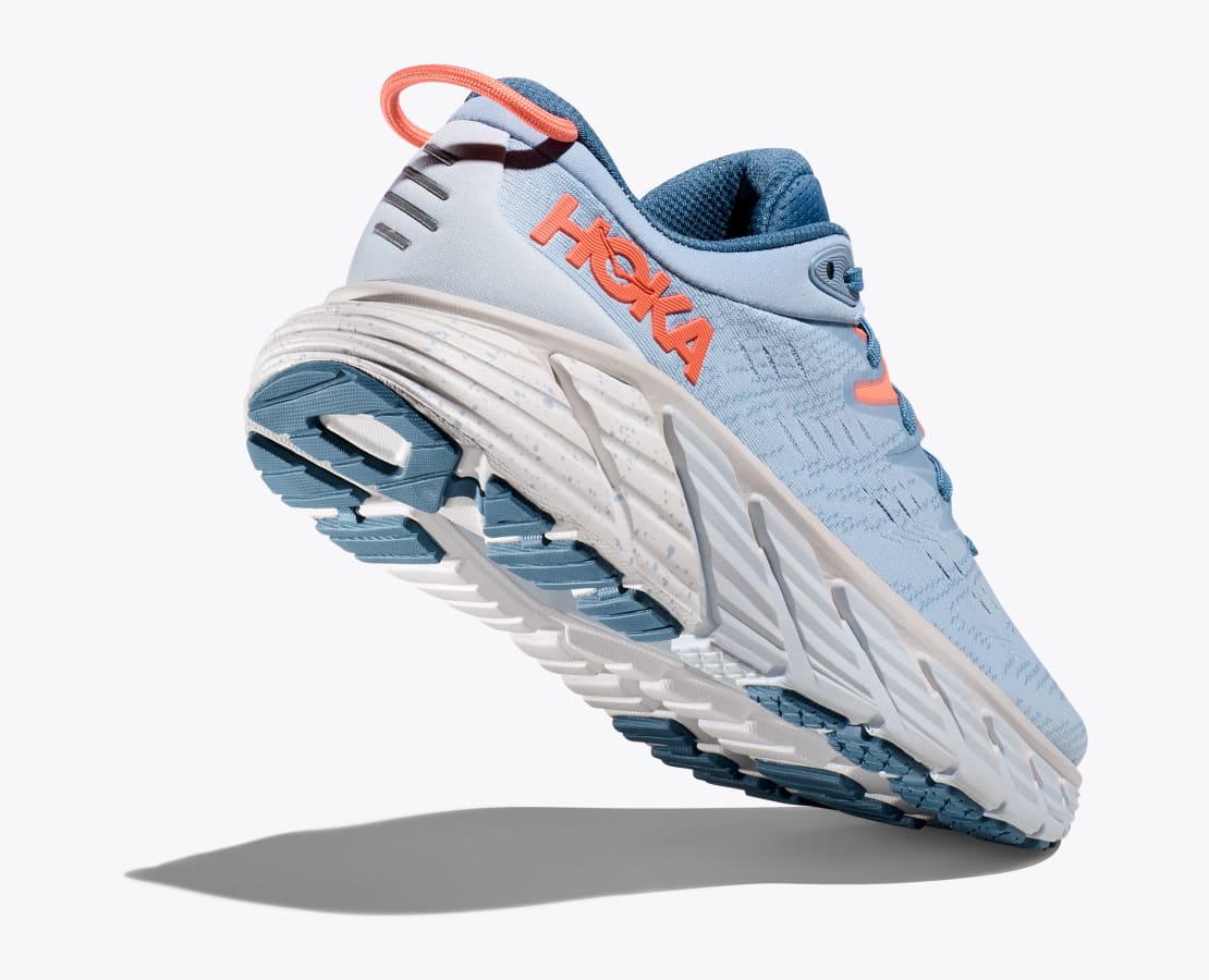 Blue and orange Hoka sneakers for women, ultimate packing list