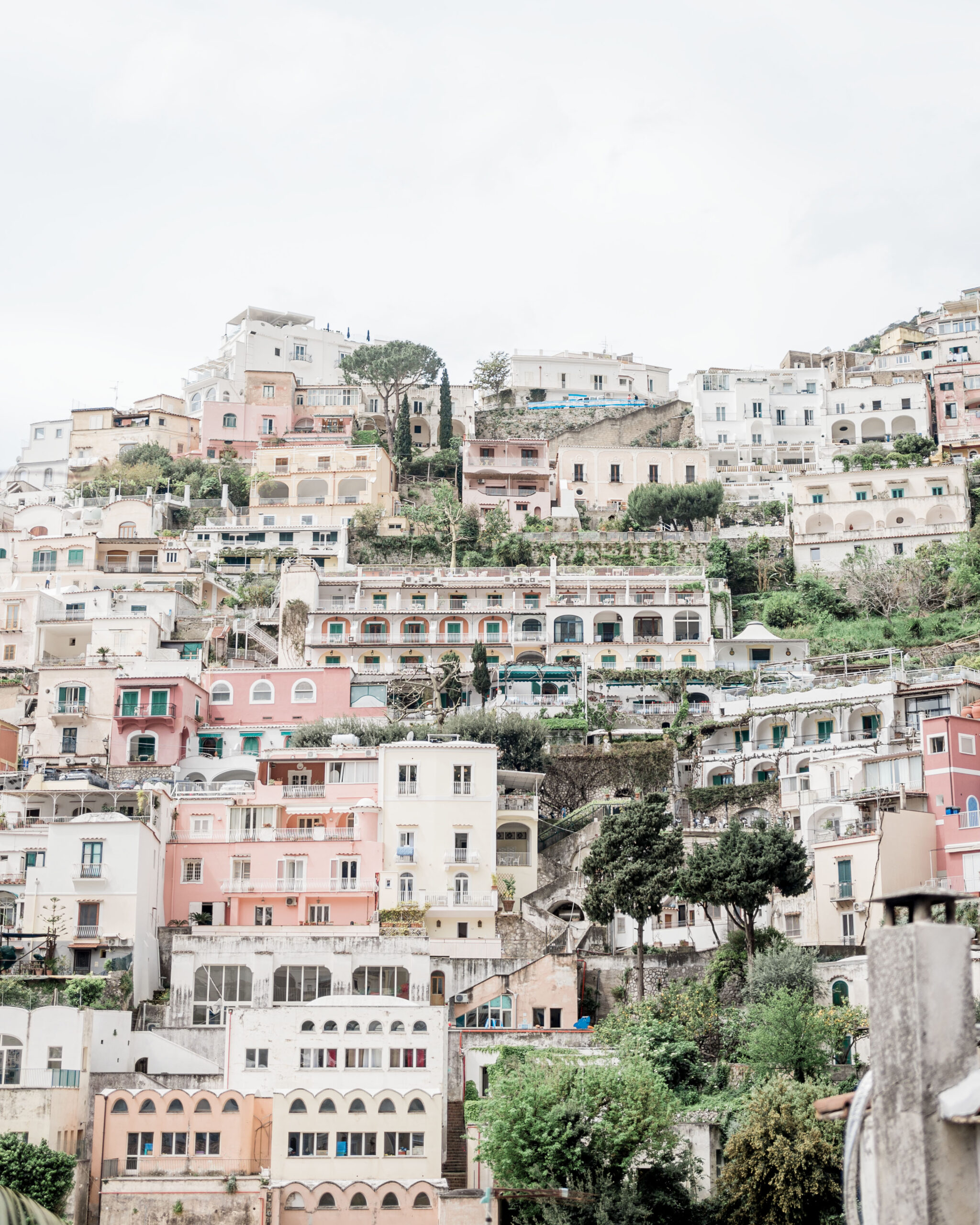 Hotel Poseidon pictured amongst other buildings on the hillside of Positano, luxurious hotel