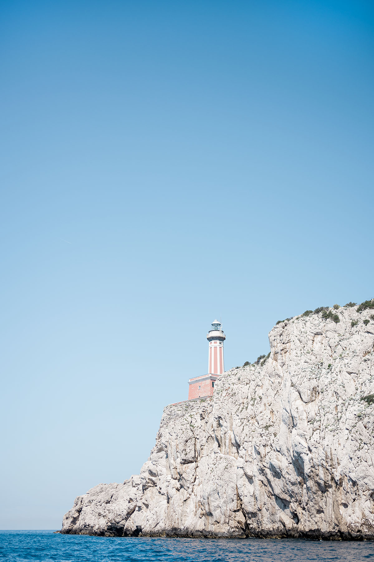 Lighthouse on top of cliff on Capri Island
