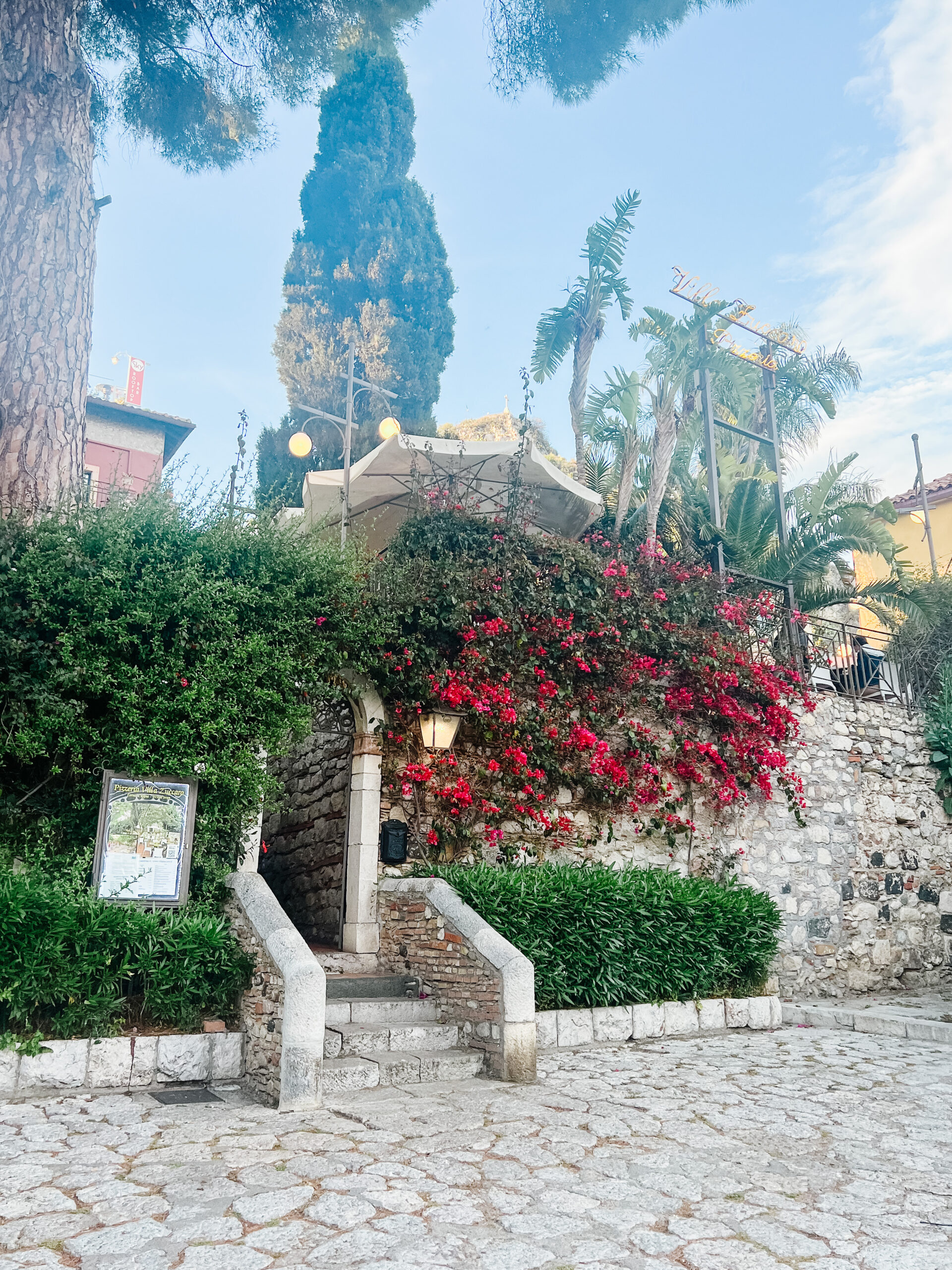 Villa Zucharo Pizzeria Taormina Sicily entrance with florals and steps, 10 day Italy Itinerary