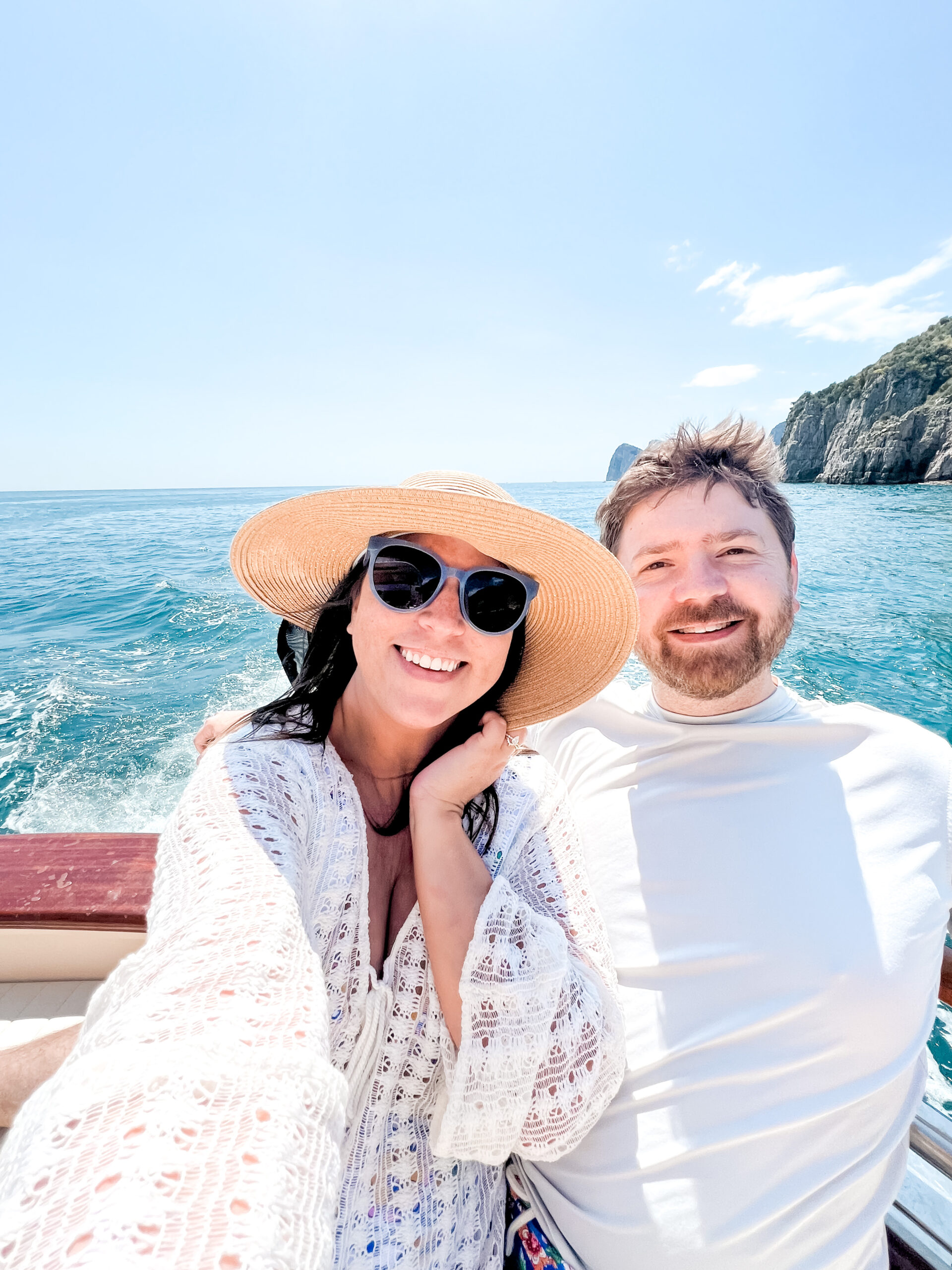 John and Brittney Naylor taking a selfie on their private boat tour of Capri from Positano, Italy