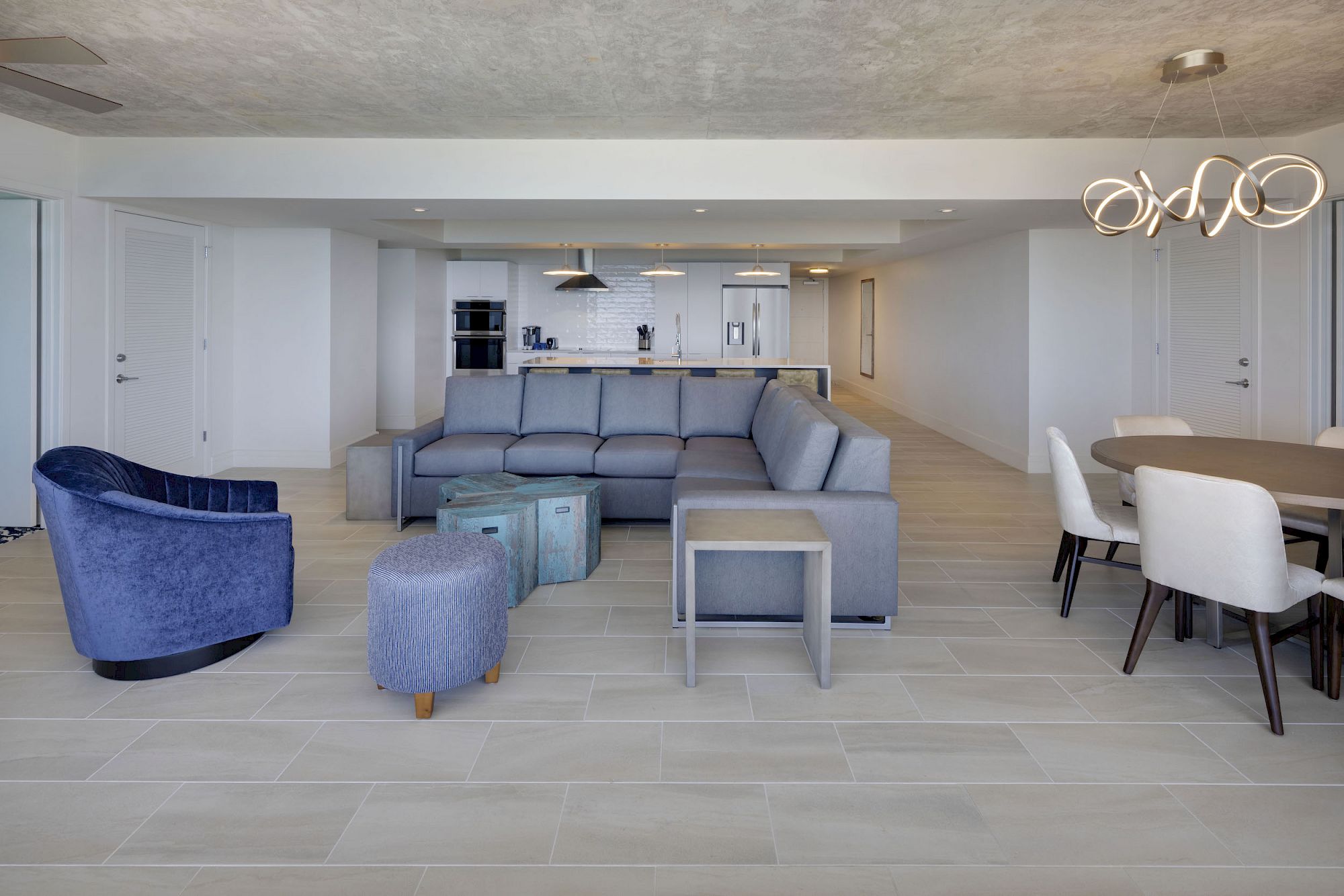 Living room and kitchen at Max Daytona Beach Resort