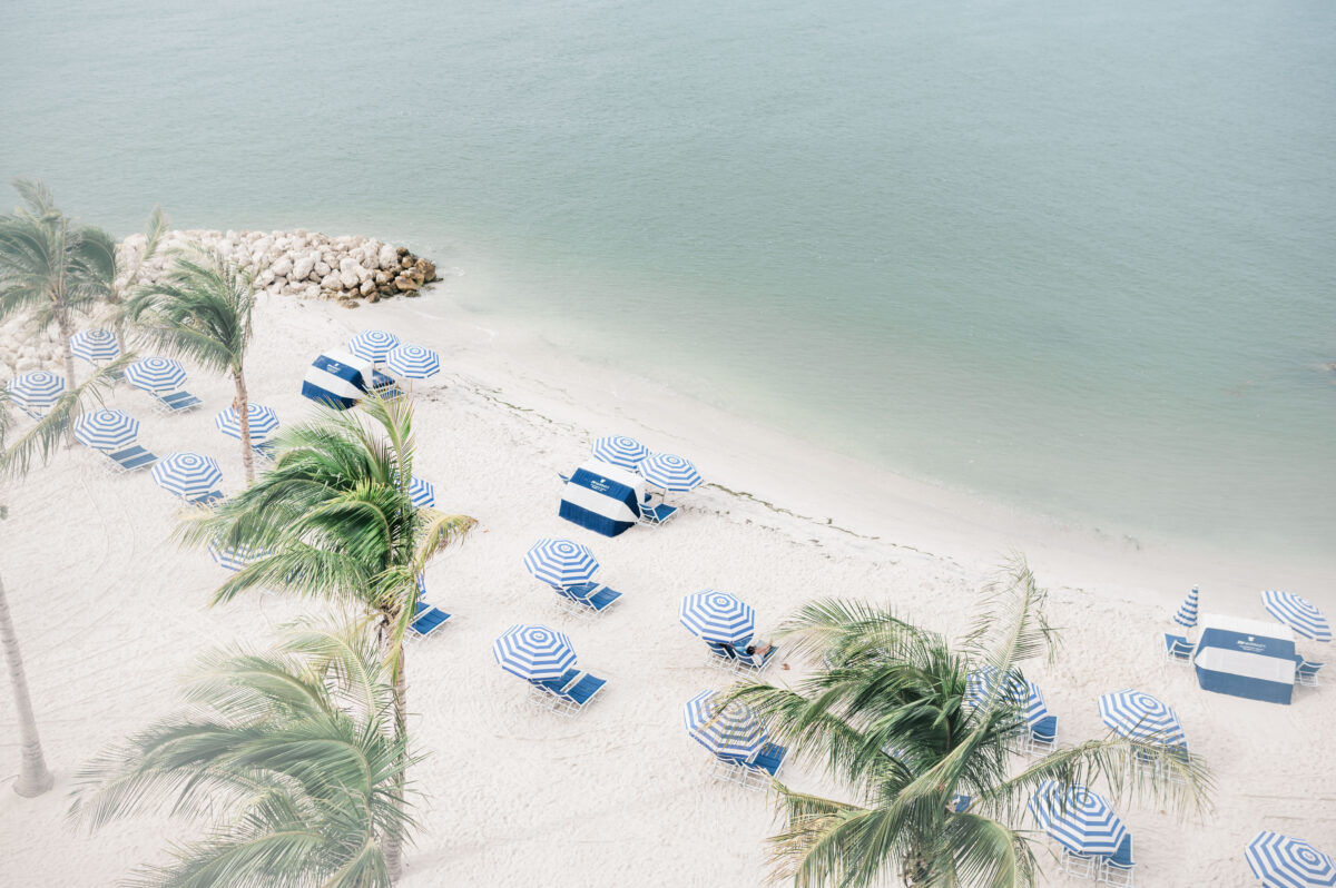 beach cabanas and umbrellas on the waterfront of the best beach resort in Clearwater Beach, Florida JW Marriott Clearwater Beach