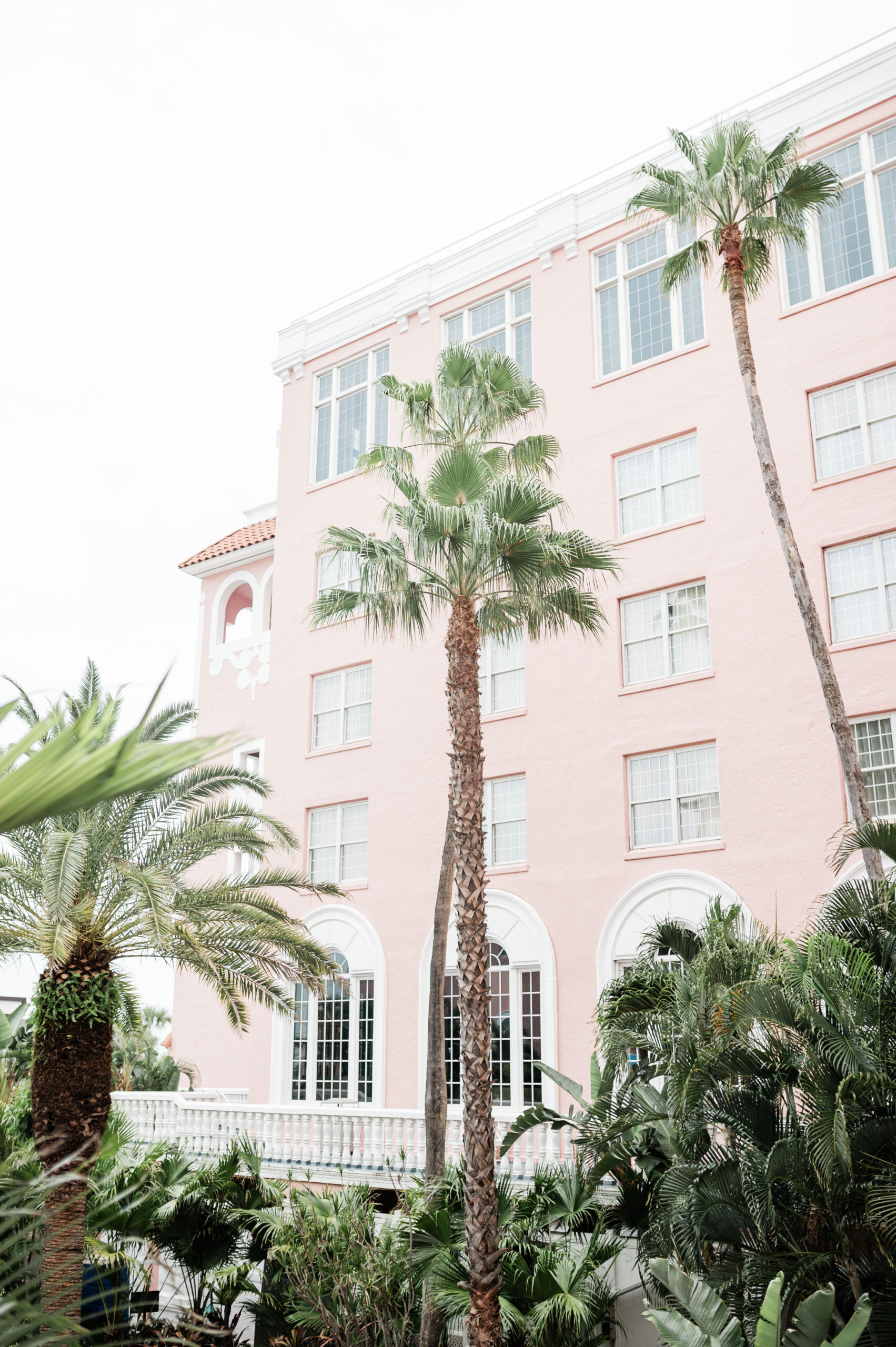 Pink Palace exterior and palm trees at The Don CeSar in Saint Pete, Florida's most instagrammable hotel