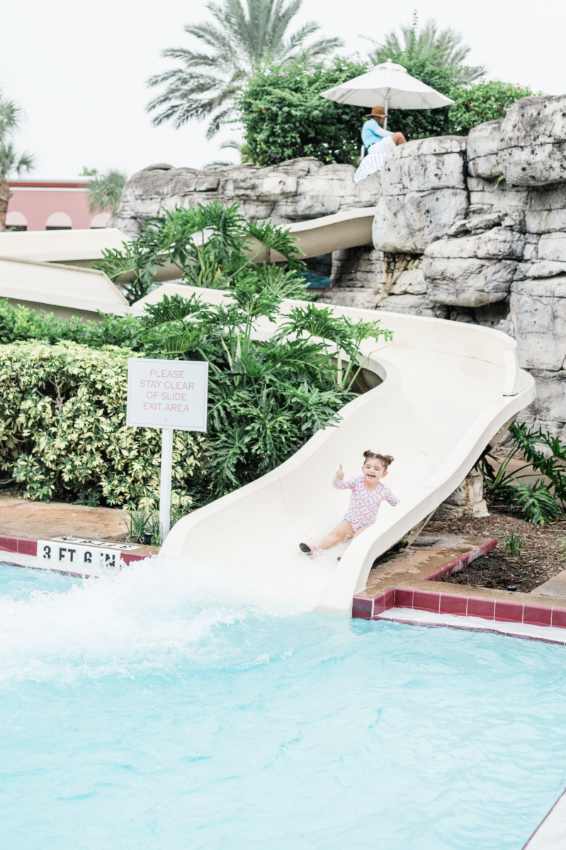 Eleanor going down water slide at Caribe Royale in Orlando