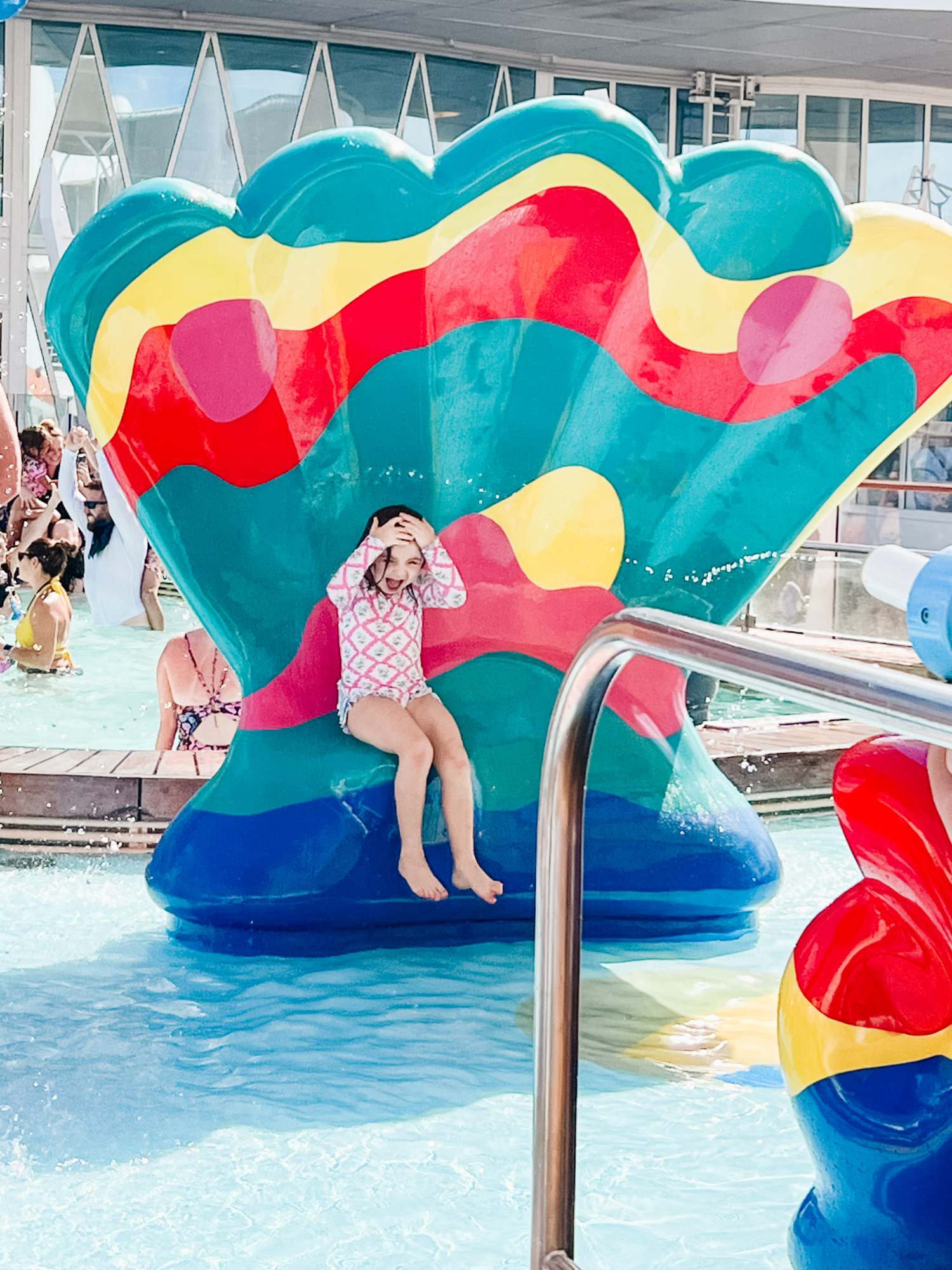 Eleanor playing in the water park area on board the Allure of Seas Royal Caribbean Cruise. Cruising with Kids.