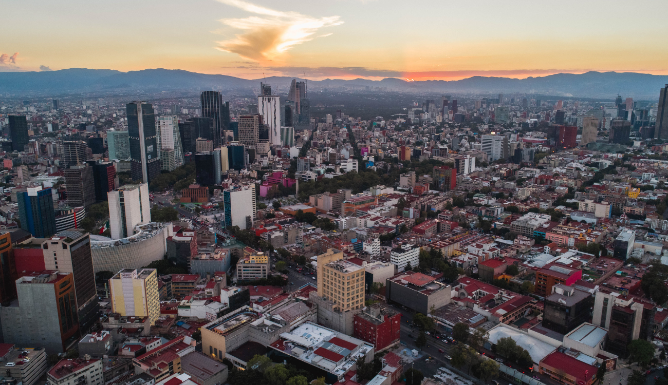 Bird's eye view of Mexico City, Mexico at sunset. Skyscrapers. Best spring break destinations for families.
