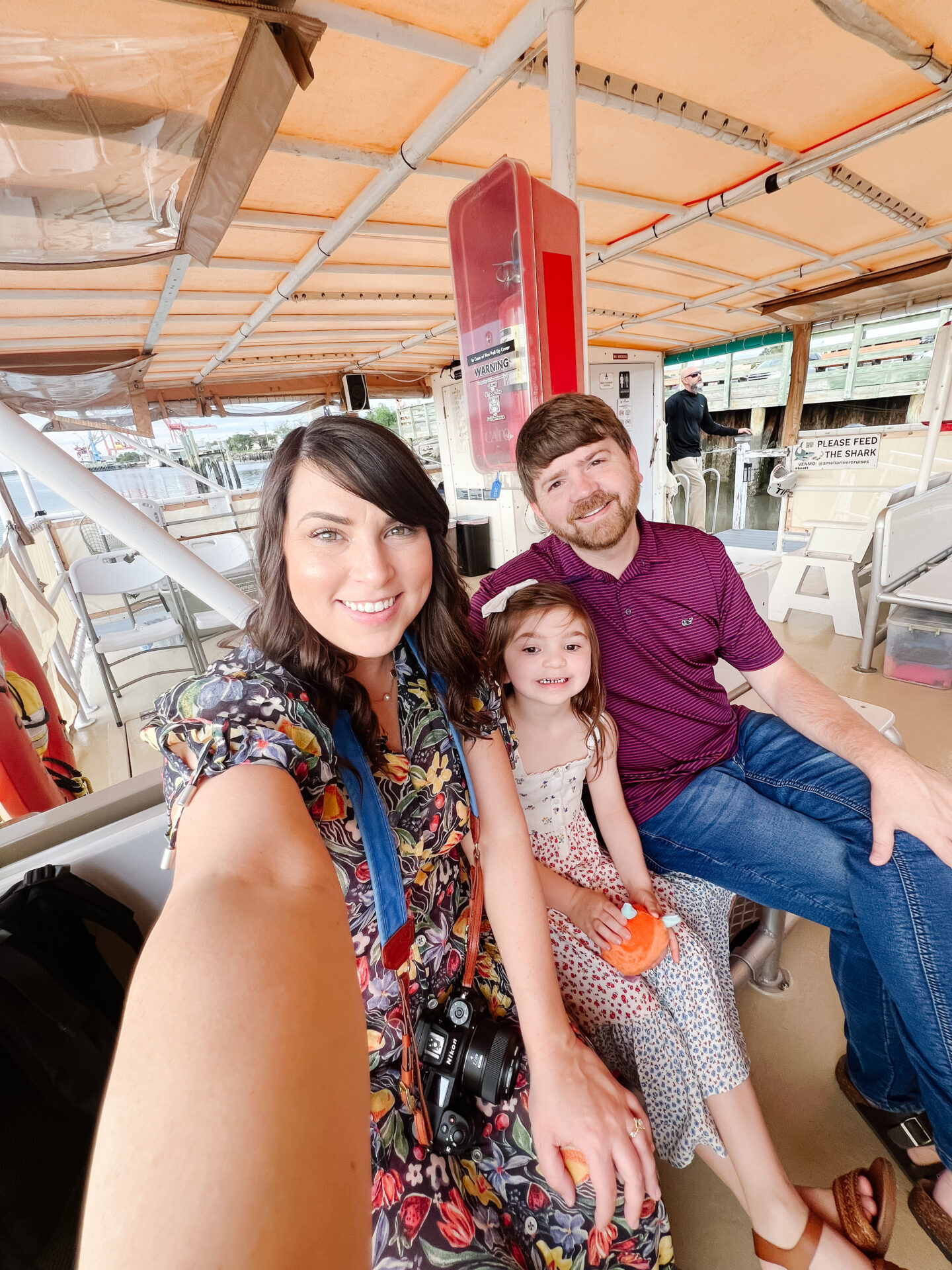 a selfie of a family on boat with Amelia River Cruises, things to do in Amelia Island, Weekend in Amelia Island