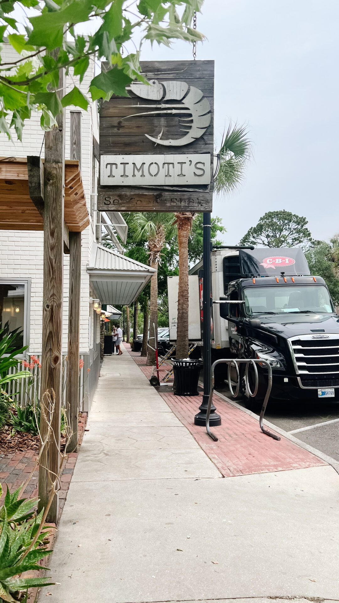 Timoti's main signage from the sidewalk in downtown Amelia Island