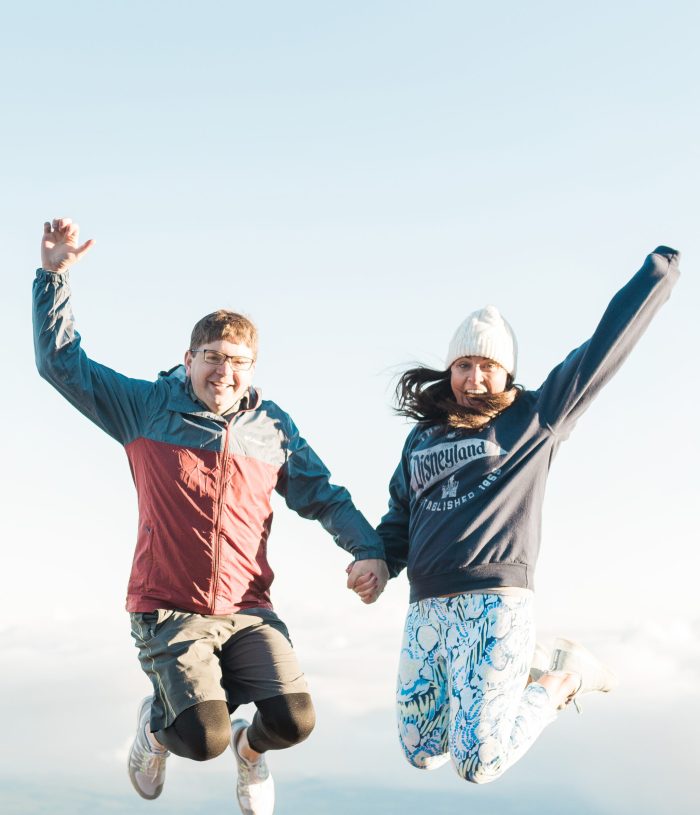 john and brittney naylor jumping up in the air in maui hawaii at haleakalah national park